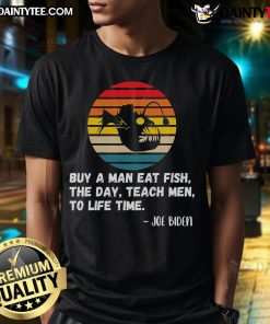 Funny Joe Biden T-shirt with retro sunset design: 'Buy a man a fish, teach a man to fish' slogan.