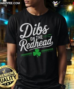 Alt Text: Funny St. Patrick's Day Dibs on the Redhead Shamrock T-Shirt featuring playful graphics and festive green colors.