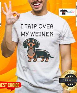 Funny tripping over my Weiner Dachshund T-shirt featuring a playful Doxie illustration, perfect for dog lovers.