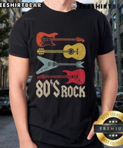 Vintage 1980s T-shirt featuring a guitar and cassette tape design celebrating iconic 80s rock band music.