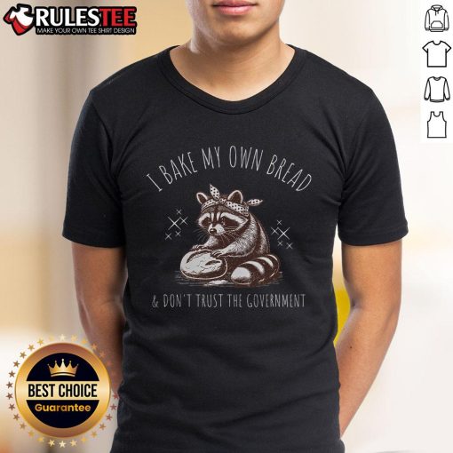 Alt Text: Good I Bake My Own Bread And Don't Trust The Government raccoon t-shirt with humorous design for food lovers.