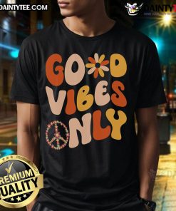 Good Vibes Only Peace Love 60s 70s T-Shirt featuring vibrant retro design, perfect for vintage fashion enthusiasts.
