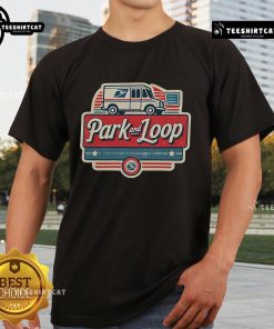 Nice park scene featuring a postal worker with a mail truck wearing a 'Loop Letter Carrier' T-shirt.