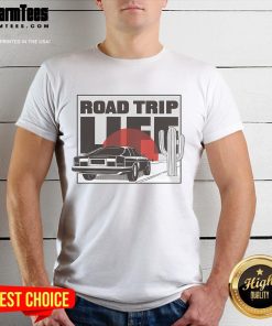 Vintage car at sunset on a road trip, featured on a 'Nice Road Trip Life' T-shirt design, perfect for adventure lovers.