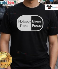 Robbie Williams 'Nobody Knows I'm On Prozac' T-Shirt featuring a vibrant design celebrating mental health awareness.