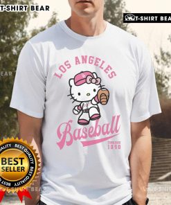 Official Hello Kitty Los Angeles Dodgers T-Shirt featuring a cute design with Hello Kitty and Dodgers logo in vibrant colors.