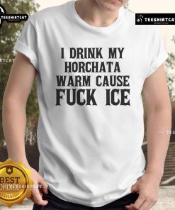 Alt Text: Official 'I Drink My Horchata Warm Cause F* Ice' Deportation Protest T-Shirt showcasing bold, colorful design.