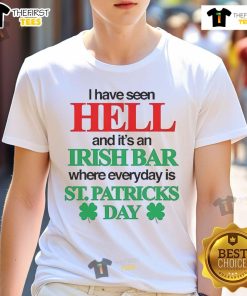 Alt Text: Official I Have Seen Hell And It's An Irish Bar T-Shirt featuring St. Patrick's Day design for festive wear.