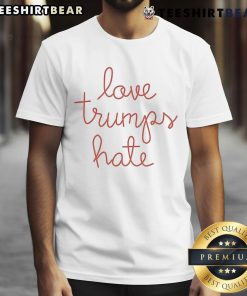 Official Lingua Franca Love Trumps Hate T-Shirt featuring bold text in a stylish design promoting love over hate.