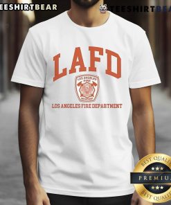 Alt Text: Official Tom Brady proudly wearing a Los Angeles Fire Department (LAFD) t-shirt at a community event.