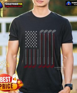 Golfer wearing an American pride golf T-shirt with the official US flag on a scenic golf course.