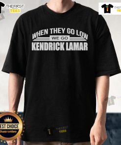 Alt Text: Official When They Go Low We Go Kendrick Lamar T-Shirt featuring bold graphics and a stylish design for fans.
