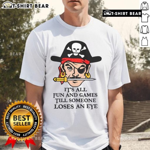 Original It's All Fun And Games Till Someone Loses An Eye T-Shirt features humorous graphic design, perfect for casual wear.