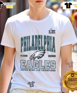 Alt Text: Original Philadelphia Eagles Super Bowl Champs T-Shirt featuring team logo and championship graphics in vibrant colors.