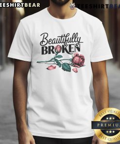 Pretty Beautifully Broken Flower T-Shirt featuring a vibrant floral design on a soft fabric background.