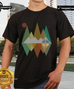 Pretty retro mountain MTB bike vintage T-shirt design featuring a classic bicycle graphic against a colorful background.