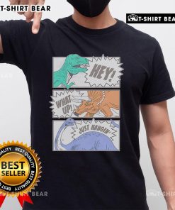 Alt Text: Top Hey What Up Just Hangin' Dinosaur Friends Club T-Shirt featuring colorful dinosaur graphics and playful text.