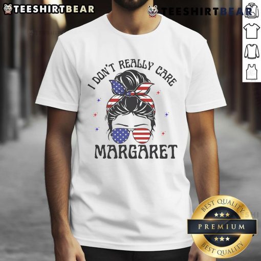 Alt Text: Top I Don't Really Care Margaret Messy Bun T-Shirt featuring a stylish design and casual fit for everyday wear.