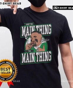 Alt Text: Top Jalen Hurts 'Keep The Main Thing The Main Thing' T-Shirt design featuring bold typography and vibrant colors.