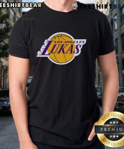 Stylish Top Los Angeles Lukas T-Shirt displayed on a wooden background, showcasing its trendy design and vibrant colors.