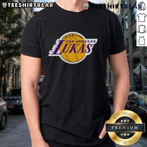 Stylish Top Los Angeles Lukas T-Shirt displayed on a wooden background, showcasing its trendy design and vibrant colors.
