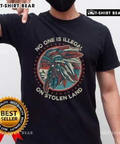 Alt Text: Top No One Is Illegal On Stolen Land Anti Trump Protest T-Shirt showcasing bold activism and social justice message.