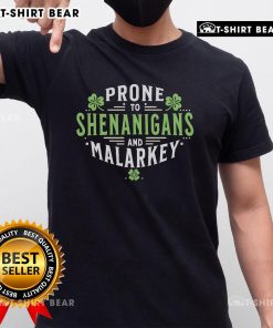 Alt Text: Top Prone to Shenanigans & Malarkey Fun Clovers St Patrick's Day T-Shirt featuring playful green clovers and festive design.
