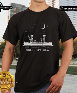 Top Skeleton Crew T-Shirt featuring a bold skeleton design, perfect for Halloween and casual wear enthusiasts.