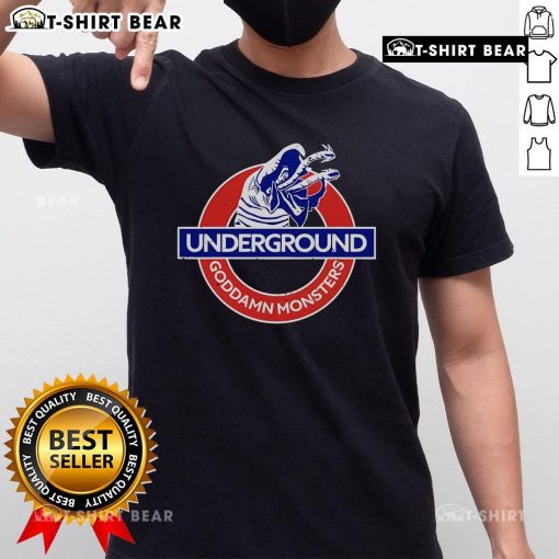Top Underground God Damn Monsters T-Shirt featuring vibrant graphics of mythical creatures on a black background.
