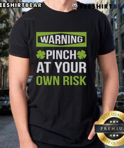 Funny leprechaun humor t-shirt featuring 'Top Warning: Pinch At Your Own Risk' design, perfect for St. Patrick's Day.