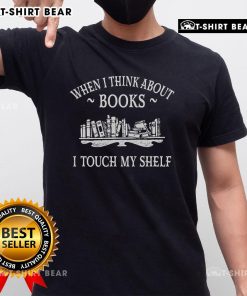 Alt Text: Romantasy lover T-shirt featuring 'When I Think About Books I Touch My Shelf' design for book enthusiasts.