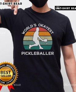 Top World's Okayest Pickleballer T-shirt featuring a retro design for humorous pickleball enthusiasts.