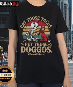 Vintage retro sunset tee featuring 'Eat Those Tacos, Pet Those Doggos' design, perfect for taco and dog lovers.