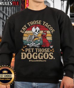 Vintage retro sunset sweatshirt featuring 'Eat Those Tacos' and 'Pet Those Doggos' designs, perfect for casual wear.