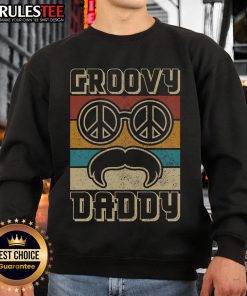 Awesome Groovy Daddy 60s 70s retro hippie sweatshirt with vibrant colors and vintage design, perfect for casual wear.