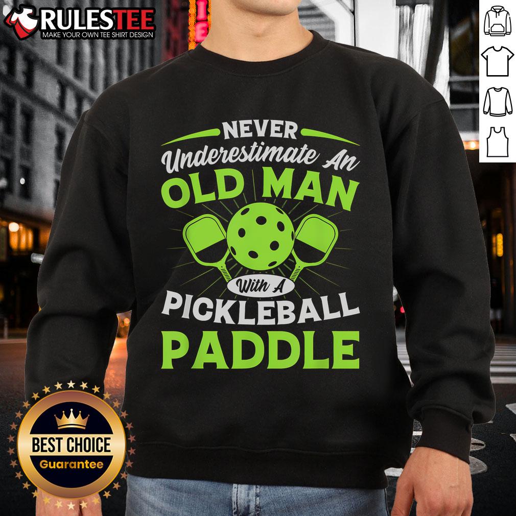 Awesome Never Underestimate An Old Man With A Pickleball Paddle Sweatshirt Old man wearing an 'Awesome Never Underestimate An Old Man With A Pickleball Paddle' sweatshirt, ready for pickleball.