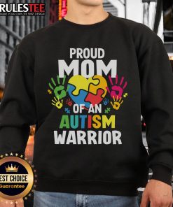 Awesome proud mom wearing sweatshirt for autism warrior son or daughter, featuring a colorful autism ribbon design.