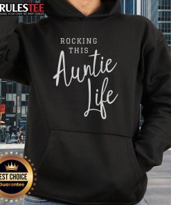 Awesome rocking this Auntie Life hoodie in a cozy setting, perfect for stylish aunties who love comfort and fun.