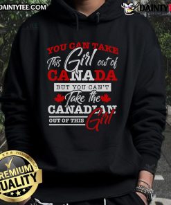 Girl wearing 'You Can Take This Girl Out Of Canada' hoodie, showcasing Canadian pride with a stylish design.