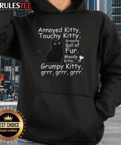 Cute black cat looking annoyed in a cozy hoodie, showcasing its grouchy yet adorable personality, perfect for cat lovers.