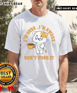 Cute cat coffee t-shirt featuring the phrase I'M Here I'M Awake Don'T Push, perfect for cat lovers and coffee enthusiasts.