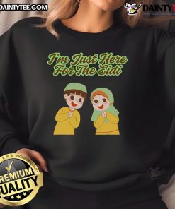 Alt Text: Cute I'm Just Here For The Eidi sweatshirt displayed on a hanger, perfect for festive celebrations and gifting.