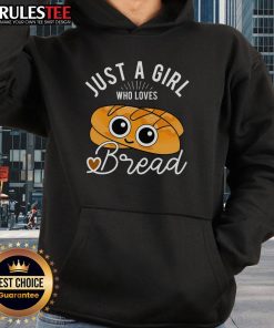 Alt Text: Cute girl wearing a 'Just a Girl Who Loves Bread' hoodie, baking with a breadmaker in a cozy kitchen setting.