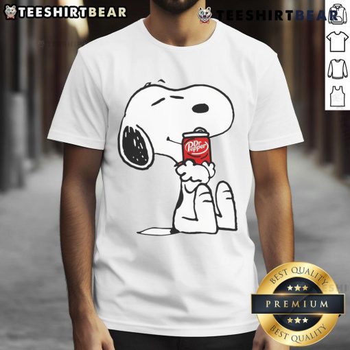 Alt Text: Cute Snoopy hugs Dr Pepper on a stylish t-shirt, perfect for fans of Peanuts and refreshing beverages.