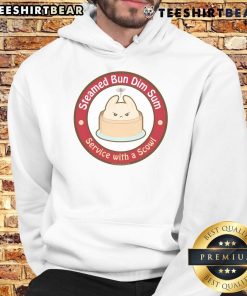 Cute steamed bun dim sum served with a playful scowl hoodie, showcasing a unique and fun dining experience.