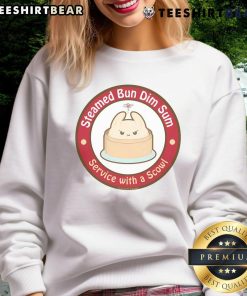 Adorable steamed bun dim sum service featuring a scowl sweatshirt, perfect for food lovers and cozy dining experiences.