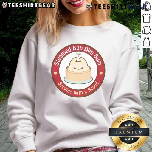 Adorable steamed bun dim sum service featuring a scowl sweatshirt, perfect for food lovers and cozy dining experiences.