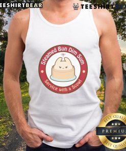 Adorable steamed bun dim sum served with a scowl tank top, showcasing a playful culinary presentation.