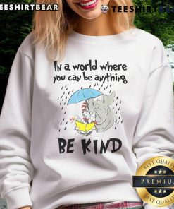 Alt Text: Cute teacher wearing a Be Kind Cat in the Hat sweatshirt, promoting kindness in education and teacher life.