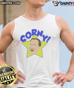 Jim Cornette wearing a funny Arcadian Vanguard tank top, showcasing his unique wrestling humor and style.